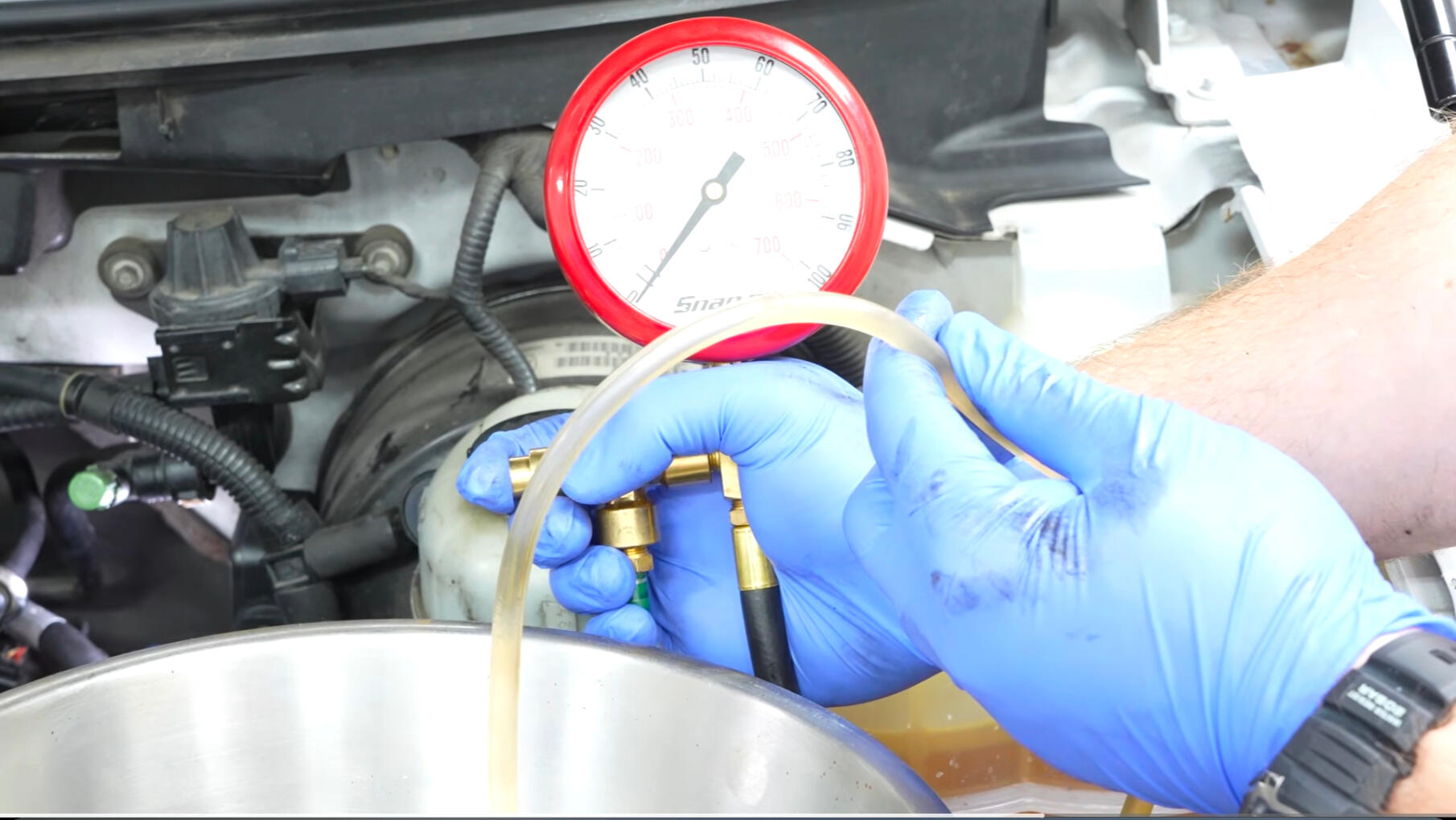 Fuel System Diagnostics Fort Worth TX Mobile mechanic performing fuel pressure testing during no-start diagnostics in Fort Worth Texas