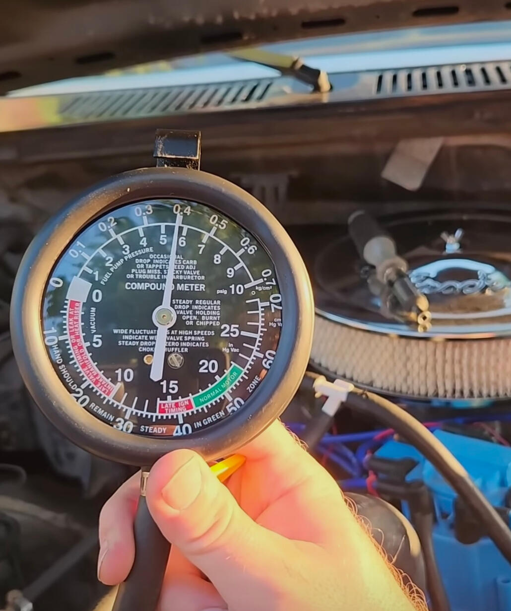 Engine Diagnostics Fort Worth TX Mobile mechanic performing engine vacuum testing during vehicle diagnostics in Fort Worth Texas